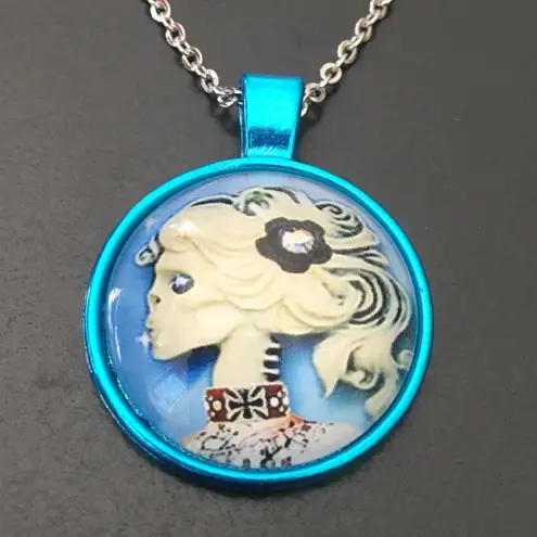 Skeleton Cameo Glass Pendant Blue