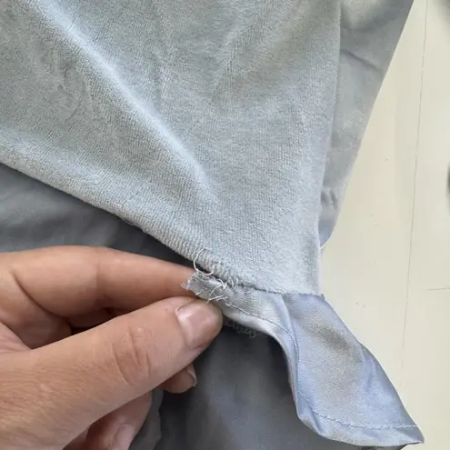 Zemeta Top Womens Small Blue Float Satin Ruffle Hem Crop Blouse Dolls Kill Blue