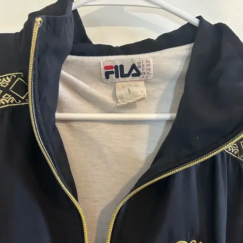 FILA Vintage 90s . Navy and gold windbreaker jacket