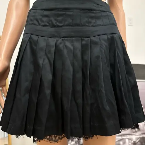 Bebe  Black Pleated Mini Tennis Skirt with lace