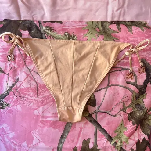 vintage tan orange bikini bottoms with gold butterfly charms