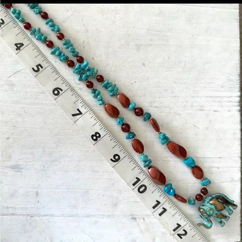 Brass elephant pendant necklace with carnelian, turquoise and red jasper beads