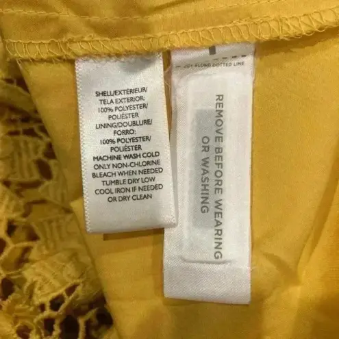 Loft Ann Taylor  yellow flower knee length dress in size 4