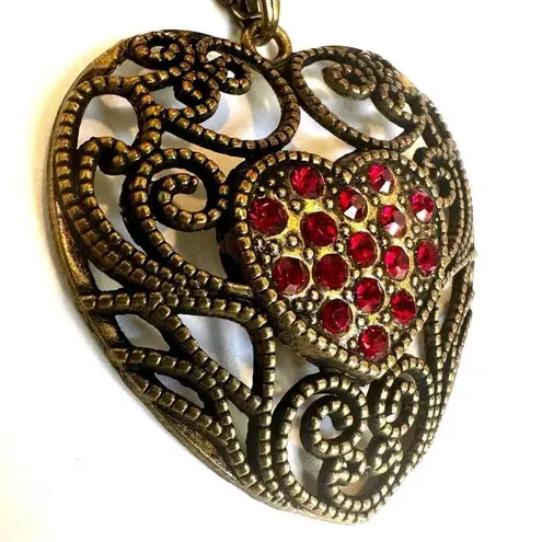 Brass tone red rhinestone heart pendant necklace