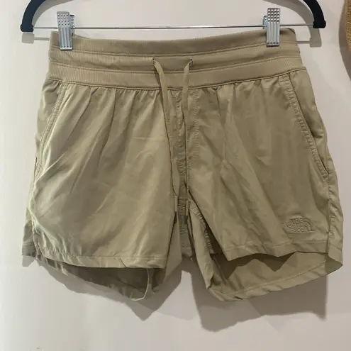 The North Face  tan shorts