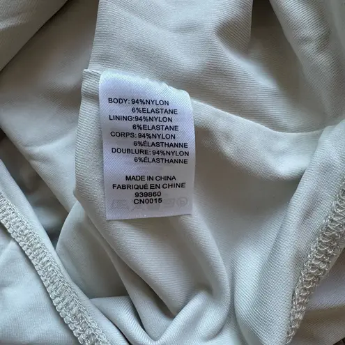 House of Harlow NWT Women's Cream Thong Short Sleeve Bodysuit Size Medium