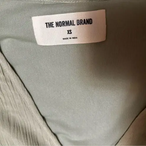 The Normal Brand NWT Ezra Crepe Cutout Dress
Size XS | SOLD OUT ONLINE