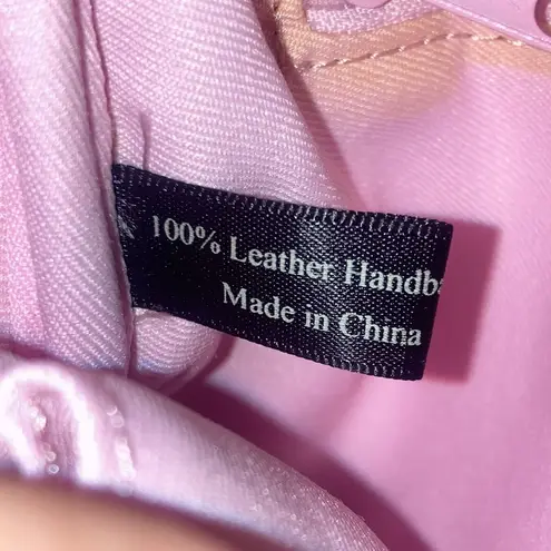 Arden B Light Pink Pearlized . Leather Wristlet