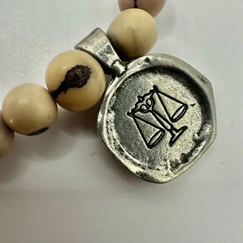 acai seed libra charm bracelet