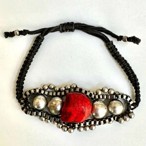 Silver tone red skeleton black cord bracelet