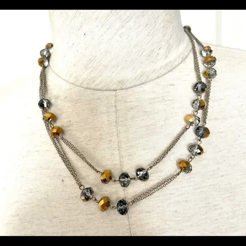 Long silver tone crystal necklace