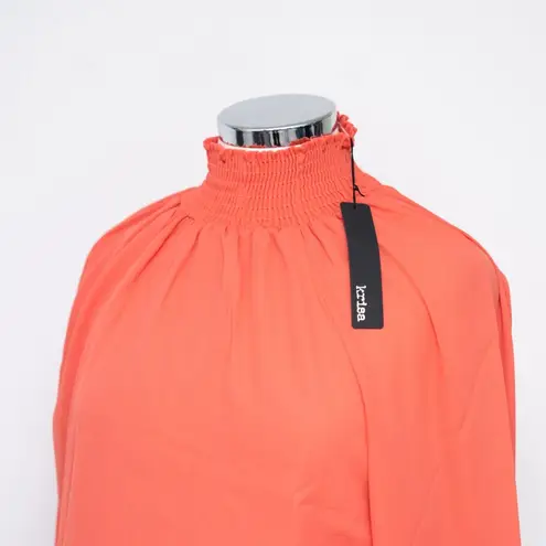 Krisa . Turtleneck Smocked dress.