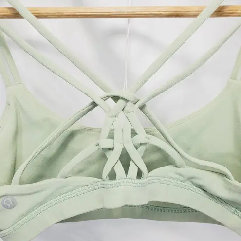 Lululemon  sports bra strappy back light green color size 4 (A-9)