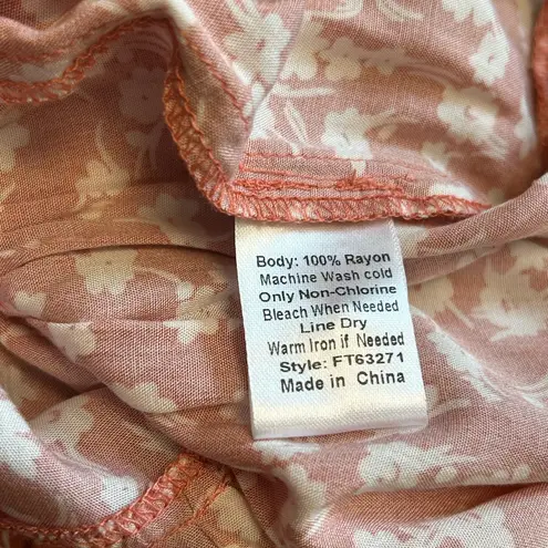 Boutique Homebody Size Small ruffle hem short sleeve babydoll blouse