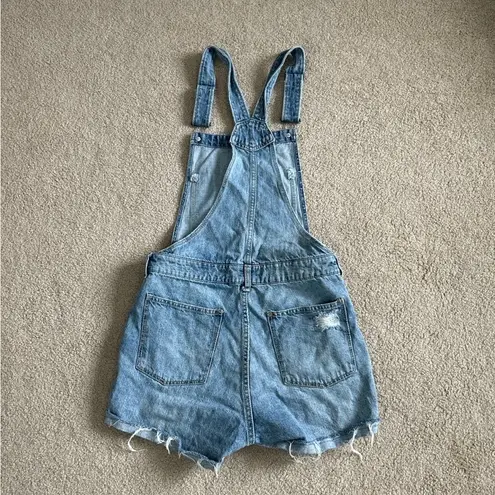 H&M  distressed blue short overalls in size 4