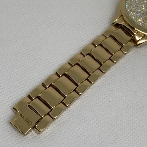ALDO  gold tone women watch 35mm round quartz analog iced dial 7.5” running thumbnail 5