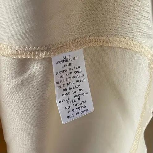 Allison New York Cream Floral Tassel Cold