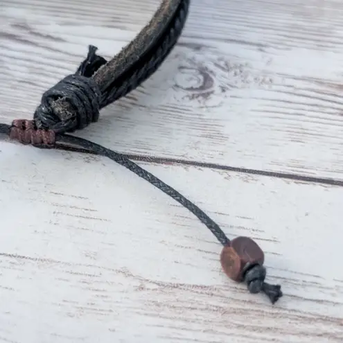 Leather? Tie Bracelet with Celtic Like Charm Black