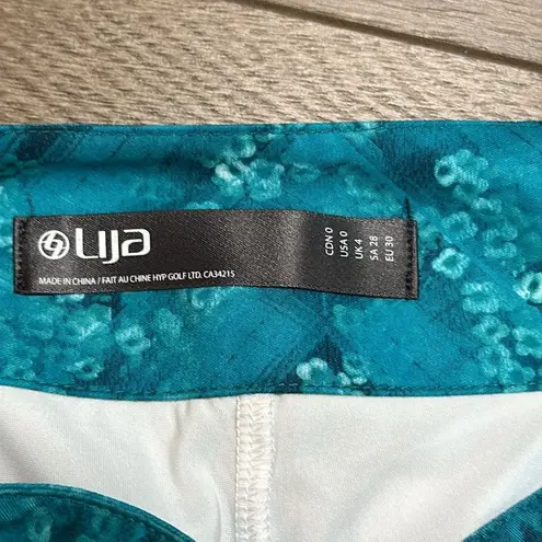 Lija 17” High Rise Turquoise Floral Print Golf Skirt Size 0 Blue