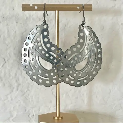 Silver tone paisley statement earrings