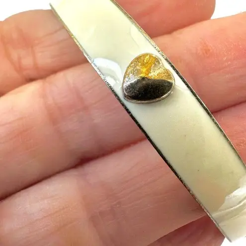 Cream and gold tone heart enamel bangle bracelet