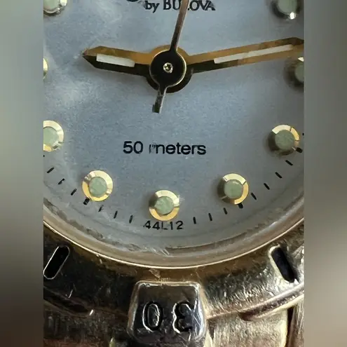 Caravelle by Bulova Ladies Watch Gold Tone Bracelet Pearl Dial Luminous Markers