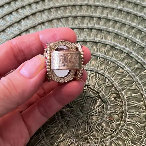 Curations beautiful large red stone ring w/flower details on an ornate band EUC