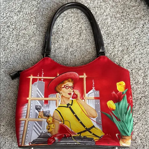 Bueno EUC tote bag. Canvas exterior with embellishments on one side