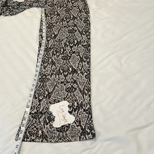 Iman size small black white metallic gold print wide leg pants worn 2 times EUC