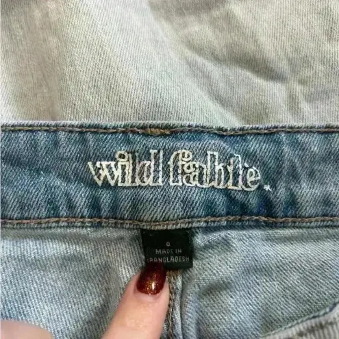 Wild Fable  light wash blue distressed high rise mom jeans in size 0