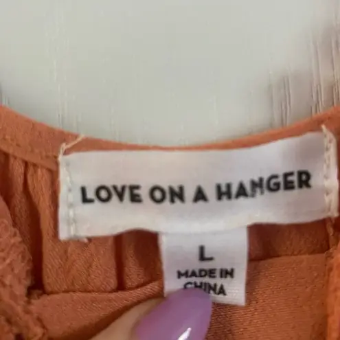 love on a hanger orange flowy tank