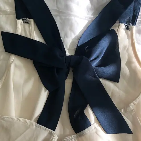 Mimi Chica Nordstrom White Flowy Top w/ Navy Back Bow Detail