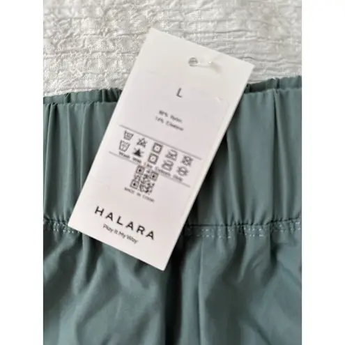 Halara  High Waisted Dolphin Hem Shorts Green Size L NWT