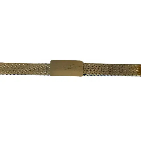 VINTAGE 1980'S GOLD TONE METAL STRETCH ARTICULATED BELT (M/L)
