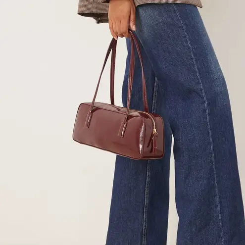ASOS - burgundy patent faux leather elongated shoulder bag