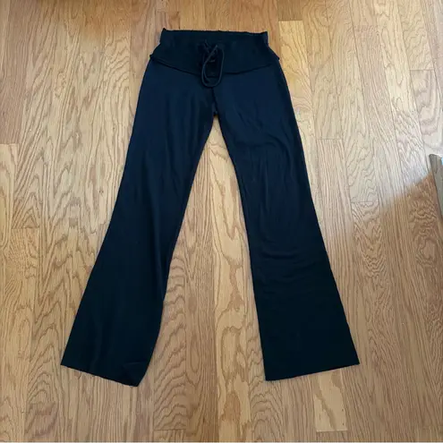 T Party Fashion T Party Black Flare Yoga Pants with Fringe Hem Size Small