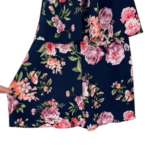 Lulu’s In the Garden Navy Blue Floral Print Romper size Large Apron Neckline