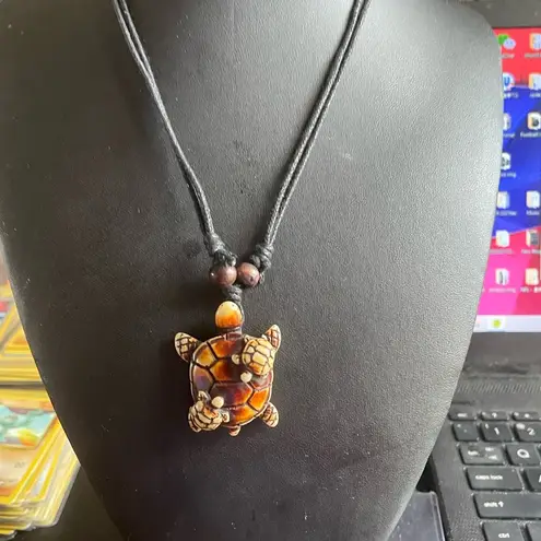 Mother sea turtle with two baby sea turtle necklace