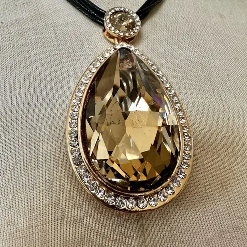 Rhinestone teardrop pendant necklace on multi Cord