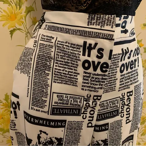 OVI all over print newspaper pants size L