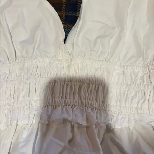 Sim & Sam crop top with tie straps, a smocked bodice, and a ruffled hem NWT