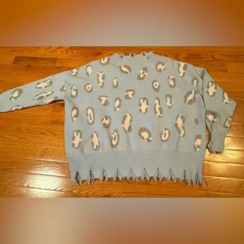 Unbranded women’s baby blue and pink Cheetah Print v V