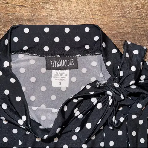 Retrolicious Black and White Polka Dot Midi Dress with Bow Detail at Neckline