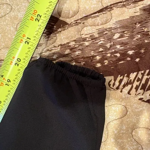 Mary Square V neckline and a gathered, peplum