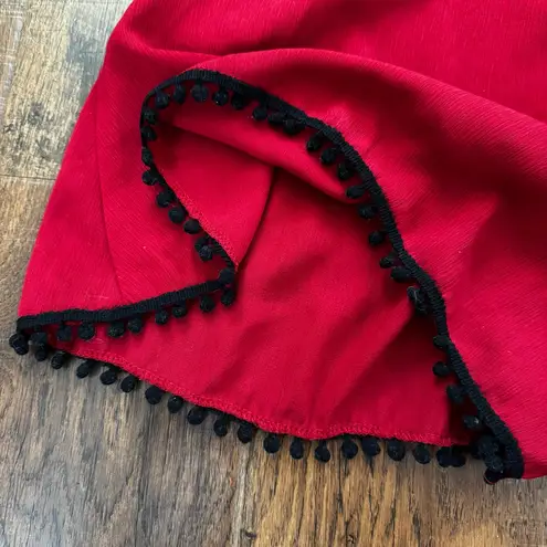 VOODOO VIXEN brick red romper with pompom trim, size L Size L
