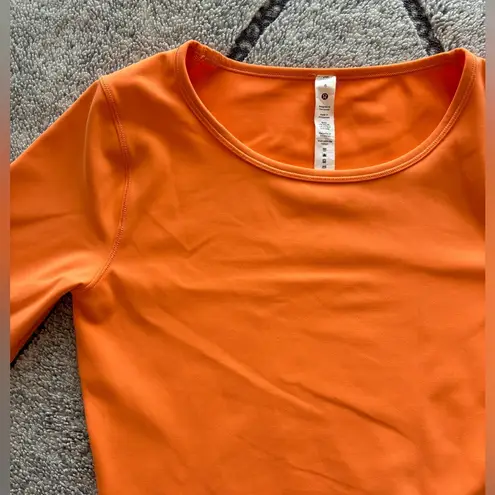 Lululemon  Wunder Train Cropped Long Sleeve Orange Frappe Size 6