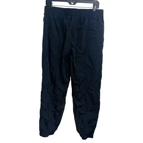 TNA Aritzia Black Parachute Track Pull On Pants Size Lā Cozycore Gym Workout Size L