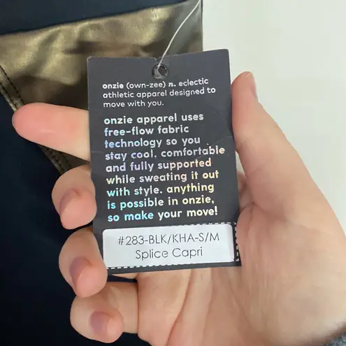 Onzie athletic splice Capri leggings in black khaki combo size S / M