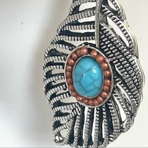 Silver tone feather and faux turquoise earrings