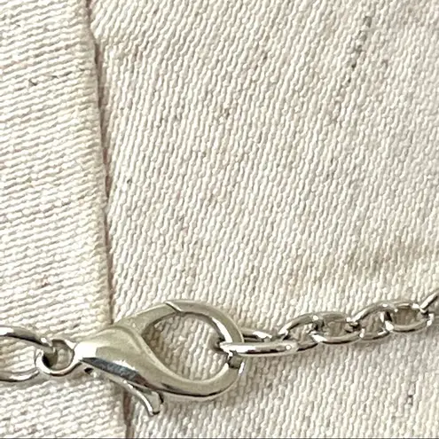 Long silver and pink bead pendant necklace